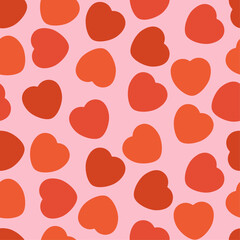 Colorful Candy Heart Pattern With Red Hearts on a Pink Background. Cheerful, Love, Valentines Day Seamless Vector Design