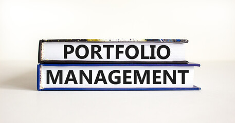 Portfolio management symbol. Concept words Portfolio management on beautiful books. Beautiful white paper background. Business Portfolio management concept. Copy space.