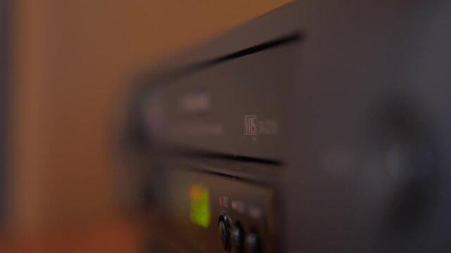 injecting remove video vhs cassette into video recorder 4k