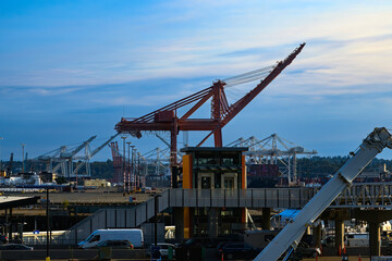 2024-08-15 THE CRANES ON THE WATERFRONT AND HARBOR ISLAND IN SEATTLE WASHINGTON FROM THE NEW COLEMAN FERRY DOCK WITH A NICE SKY