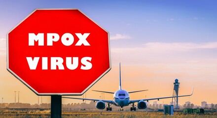 Warning sign about mpox virus at an airport during sunset with an airplane in the background