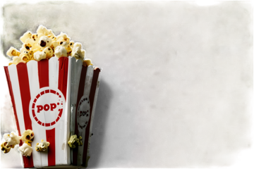 Popcorn flying out of red white striped paper box isolated on white, transparent background, PNG, with copy space. Splash, levitation of popcorn grains.