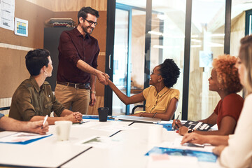 Office, business people and handshake in meeting for introduction, welcome and onboarding with smile. Team, employees and manager of marketing agency with client for shaking hands, deal or thank you