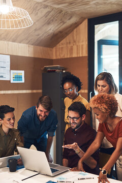Business, mentor and group with coaching on laptop for induction training, onboarding and company orientation. Intern diversity, people and manager for introduction to sales system and work process