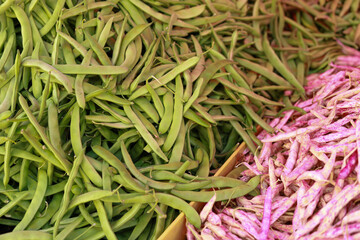 Heap of fresh organic green runner beans of raw