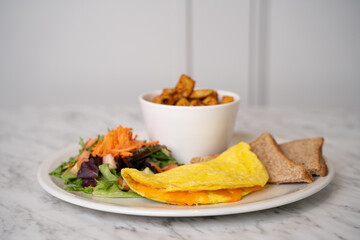 Breakfast plate with omelette isolated.