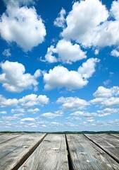 Wooden Planks Under Blue Sky With White Clouds