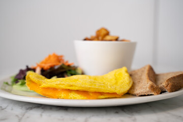 Breakfast plate with omelette isolated.