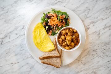 Breakfast plate with omelette isolated.