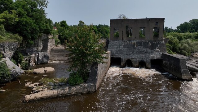 Old abandoned ruin architecture of mill dam on the Black River in Watertown, NY 