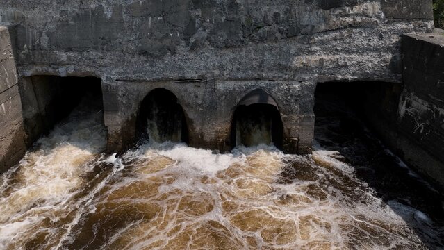 Old abandoned ruin architecture of mill dam on the Black River in Watertown, NY 