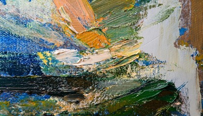 A close-up view of a canvas with thick, textured layers of paint applied in bold, sweeping b
