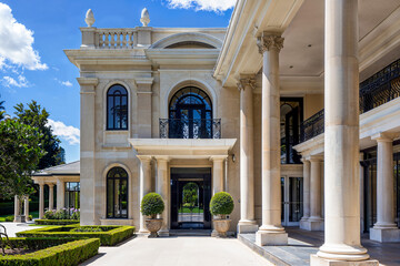 Obraz premium Luxury neoclassical stone mansion, black frame arched windows, columns, two story. New Zealand landscape, fictitious property