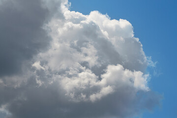 An aerial shot of a cloud, capturing the beauty of nature, showing the intricate details of cloud...