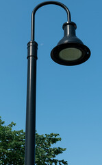 street lamp on blue sky background