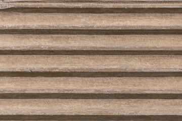 Striped stone background. Details and elements of architecture.