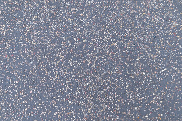 Surface with small multi-colored stones. Background