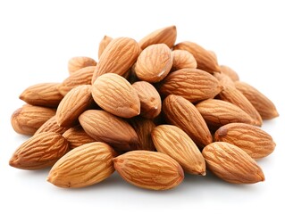 Fototapeta premium Fresh raw almonds piled together on a white surface, showcasing their textured shells