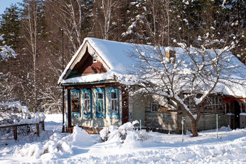 A house made of logs. Winter. Old Russian house