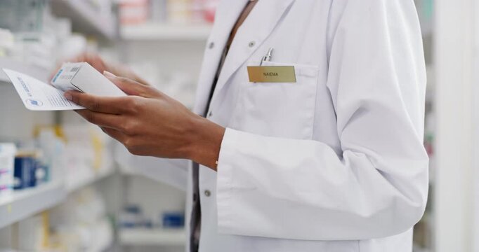 Pharmacist, hands and medicine shelf with prescription letter with stock management, reading label and medical inventory. Doctor, person or pharmacy worker with healthcare receipt and box or product