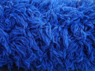 fluffy fur of dark blue fabric synthetic fiber, housework tool for cleaning