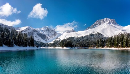 Obraz premium Snow-Capped Mountains Reflected in Lake