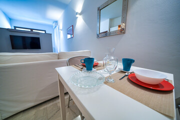 Kitchen and TV in a modern bed and breakfast interior
