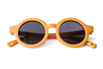 Yellow kids sunglasses close up on white background.