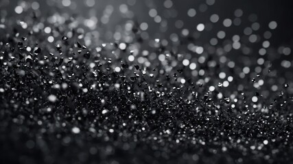 Fototapeta premium Monochromatic image with black and white glitter bokeh, creating a sophisticated and timeless decorative design.