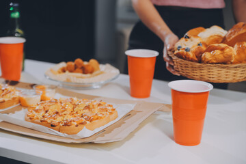 Group of young friends eating pizza.Home party.
