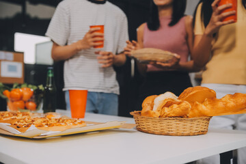 Group of young friends eating pizza.Home party.