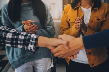 portrait of Business people shaking hands, finishing up a meeting