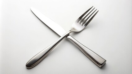 A stainless steel fork and knife resting parallel to each other, viewed from directly above on a clean white background, ready for a culinary experience.