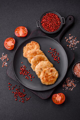 Delicious fresh fried minced fish cutlets with spices and herbs