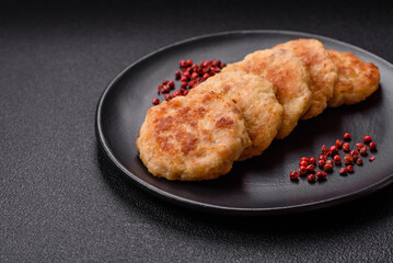 Delicious fresh fried minced fish cutlets with spices and herbs