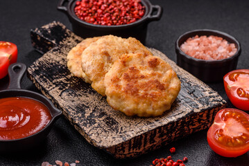 Delicious fresh fried minced fish cutlets with spices and herbs