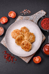 Delicious fresh fried minced fish cutlets with spices and herbs