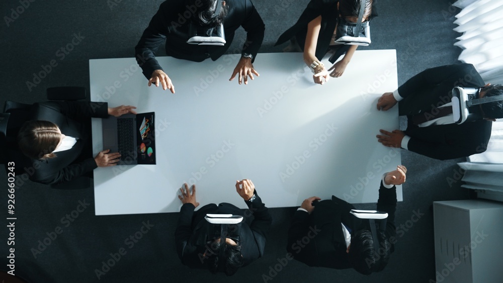 Poster top down aerial view of professional business team wear vr headset to enter virtual world while sitt