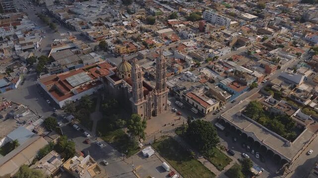 San luis potosi Aerial view of the church Parroquia Basilica Santuario de Nuestra Se&ntilde;ora de Guadalupe during sunset with the city in the background, beautiful religious catholic architecture