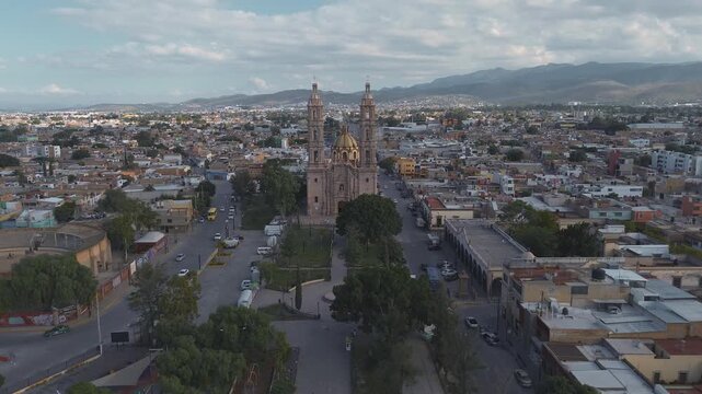 San luis potosi Aerial view of the church Parroquia Basilica Santuario de Nuestra Se&ntilde;ora de Guadalupe during sunset with the city in the background, beautiful religious catholic architecture