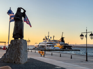 Spetses island, Greece. Laskarina Bouboulina statue at old historic port