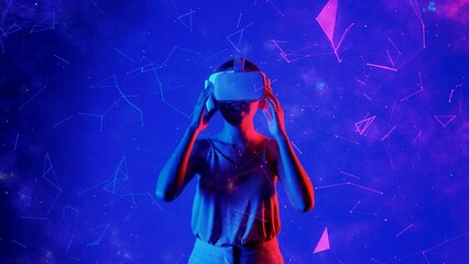 Excited smiling Asian woman looking around through VR to metaverse blue neon digital universe starry zodiac virtual space fantastic exploration nebula vibrant new star group meta world. Hallucination.