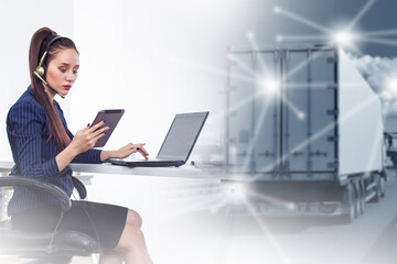 Woman business truck dispatcher. Businesswoman with gadgets working in office. Truck driving along...