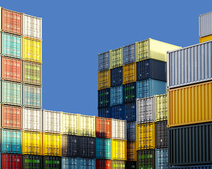 Container site. Warehouse at port. Multi-colored shipping containers under blue sky. Ship unloading area. Sea containers await transportation. Cargo arrived by ship. Tare for sea export. 3d image