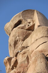 Famous Colossi of Memnon. Massive ruined statues colossi of the Pharaoh Amenhotep III. Travel and...