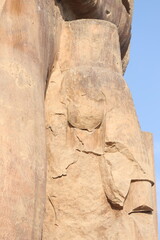 Famous Colossi of Memnon. Massive ruined statues colossi of the Pharaoh Amenhotep III. Travel and tourist landmarks nearby Luxor Egypt West Bank, Thebes, Luxor