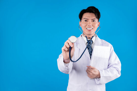 Smiling smart doctor holding transparent tablet with health checking by stethoscope futuristic technology attempting to remedy therapy healthcare innovation interface 3D hologram screen. Contrivance. - Powered by Adobe