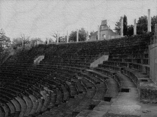 Fototapeta premium Roman amphitheater in village in Provence in winter