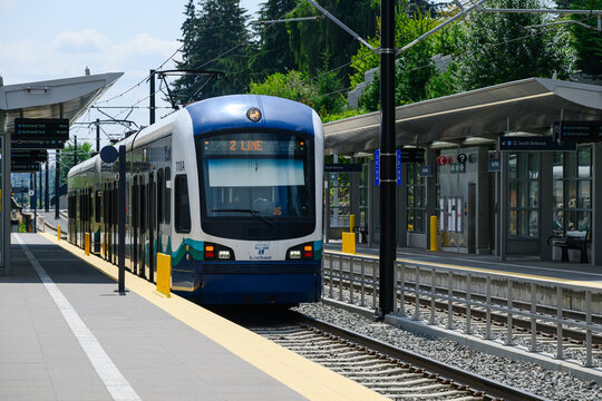 Bellevue, WA, USA - August 14, 2024; Seattle Link Light Rail train at Bellevue East Main station platform in sunshine