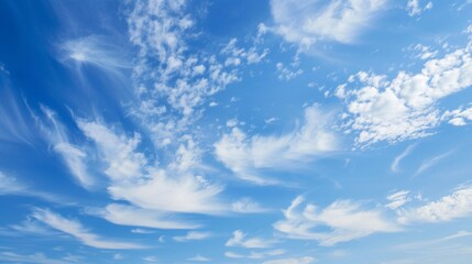 Vibrant Sky with Gentle Clouds, expansive azure canvas adorned with soft, airy white formations drifting peacefully, evoking a sense of tranquility and openness.
